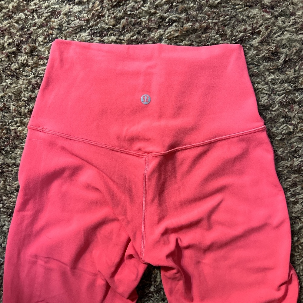 Lululemon size 4 pink leggings only worn once